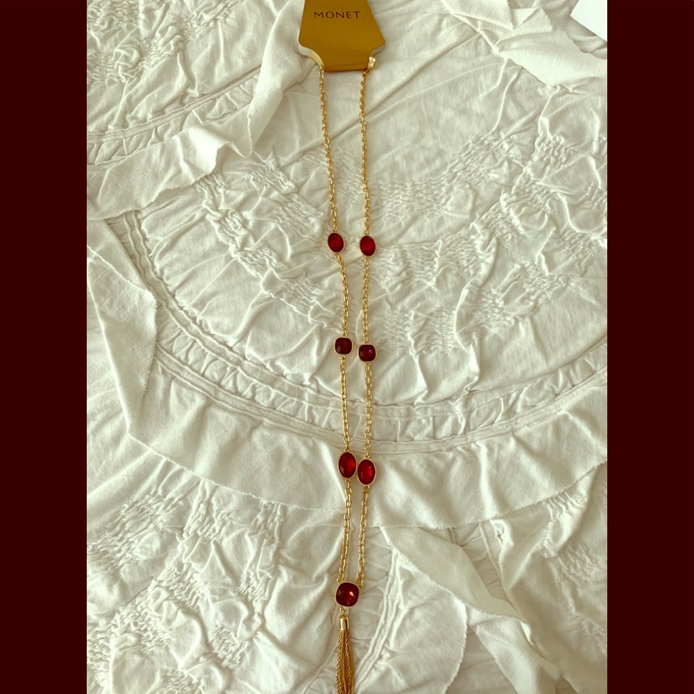 Monet costume necklace w garnet colored stones